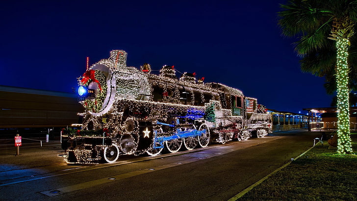 train with string lights, steam locomotive, christmas lights