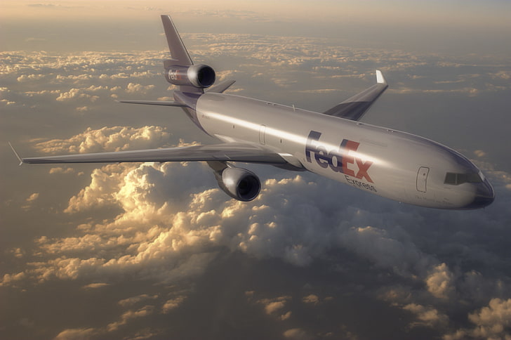 grey and white FedEx passenger plane, clouds, flight, the plane