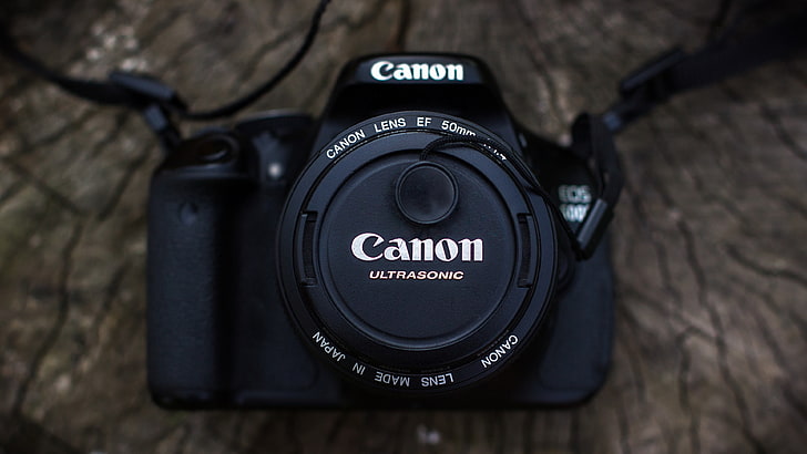 black Canon DSLR camera, technology, black color, close-up, indoors