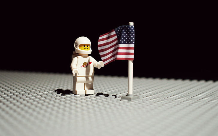 close up photo of astronaut lego minifigure and american flag toy, HD wallpaper