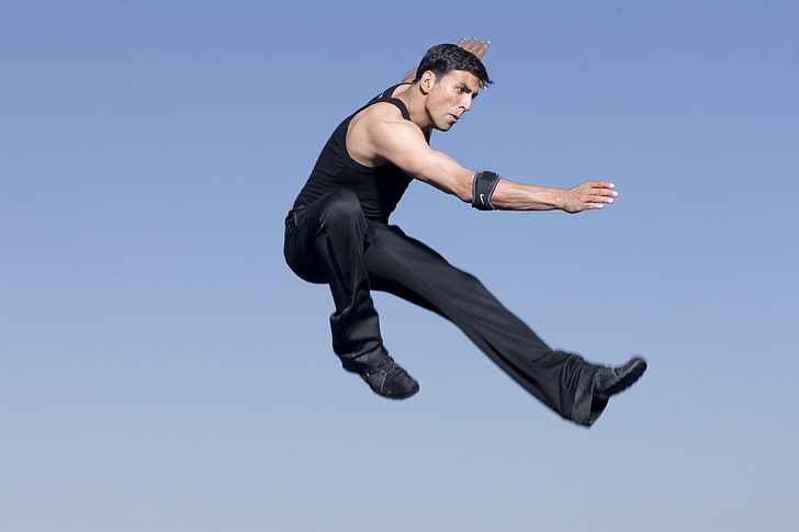 Akshay Kumar Action  Photoshoot, one person, full length, mid-air