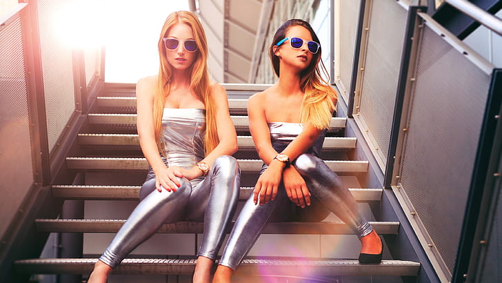 Silver dress girls sit at stairs, glasses, blonde