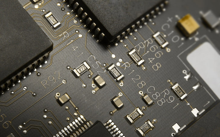 black circuit board, chips, PCB, transistors, resistor, no people