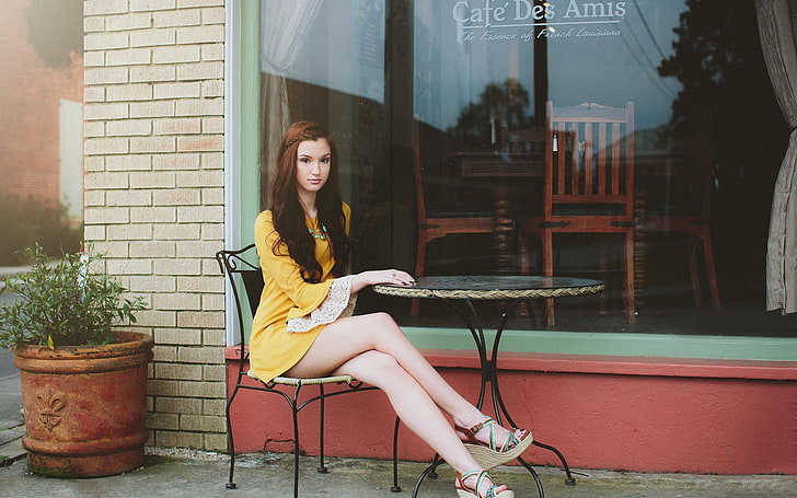 women's yellow dress, table, legs together, cafes, sitting, model