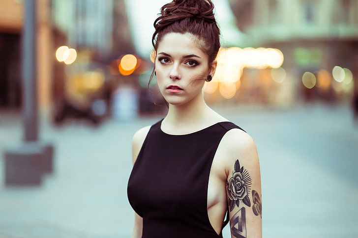 women's black sleeveless top, portrait, tattoo, pierced nose