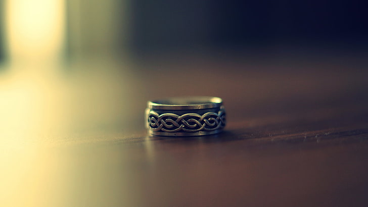 silver-colored ring, silver-colored ring, depth of field, rings