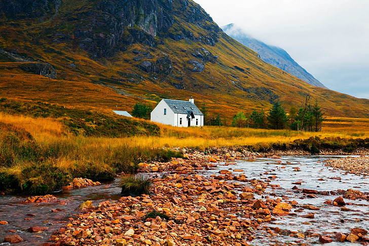 white and gray house, lake, stones, grass, mountains, nature