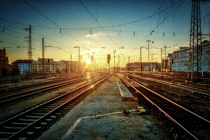 landscape photo of train station rail, rails, rails, Sun, on Rails