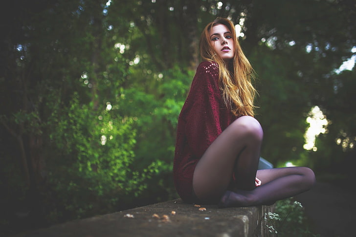 women's red long-sleeved top, selective focus photography of woman sitting near tree, HD wallpaper