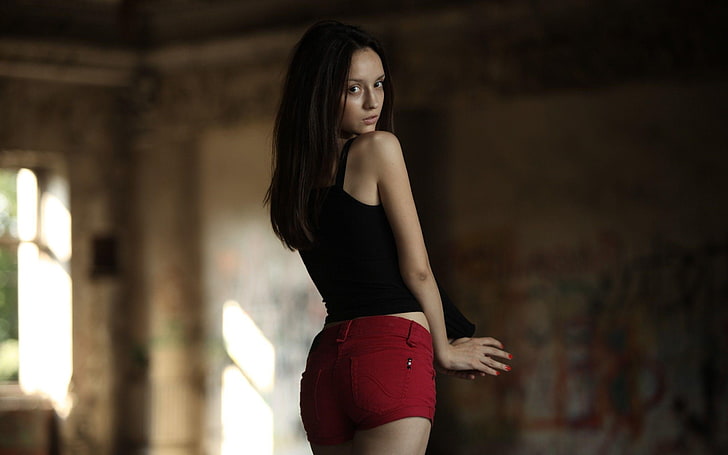 women's black tank top and red short shorts, model, brunette
