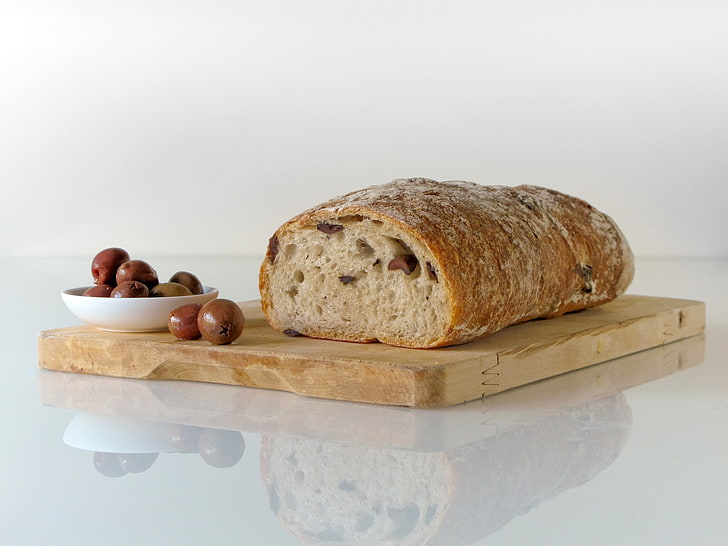 baked bread, olives, pastries, cutting board, food, freshness
