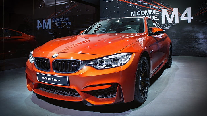 orange BMW car with text overlay, BMW M4, mode of transportation