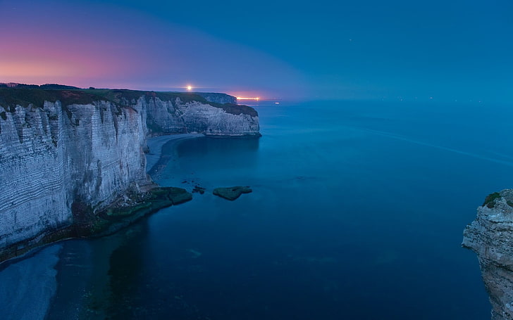 body of water, cliff, beach, sea, lights, blue, coast, evening, HD wallpaper
