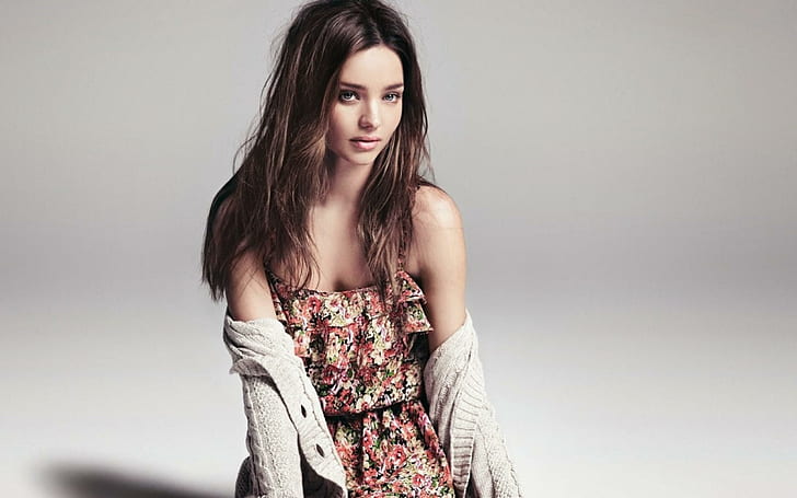 Miranda kerr 2015, women's red and yellow floral spaghetti strap dress and beige cardigan