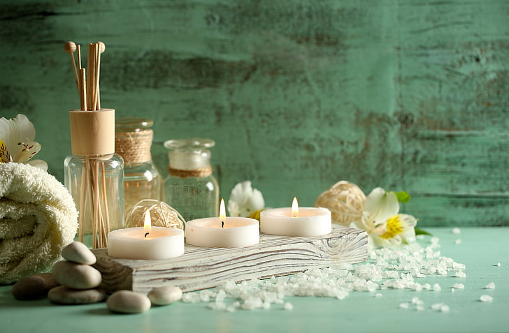 white tealight candles, stones, oil, towel, Spa, salt, flower