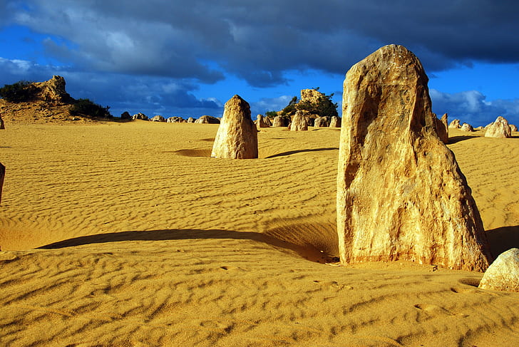 gray rock formations on desert, Pinnacles Desert, western australia