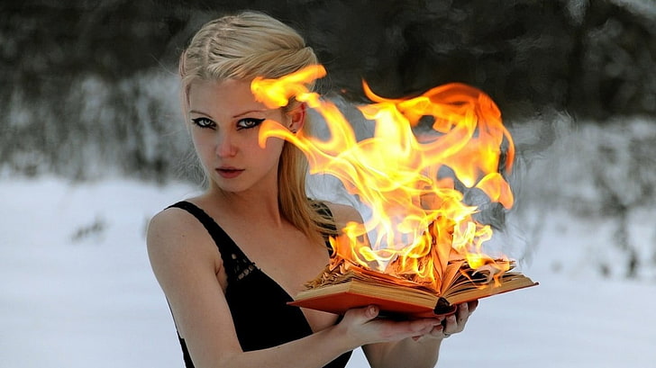 women's black sleeveless top, blonde, fire, books, green eyes