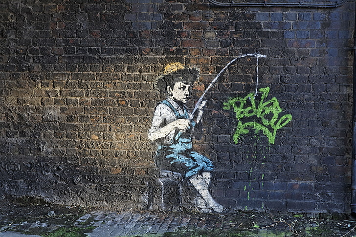 person showing graffiti wall, Banksy, wall - building feature
