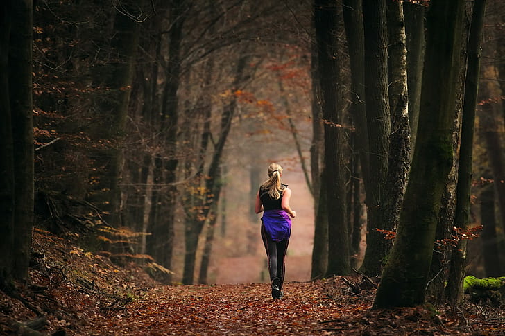 Running girl in fall, women's black leggings, sports