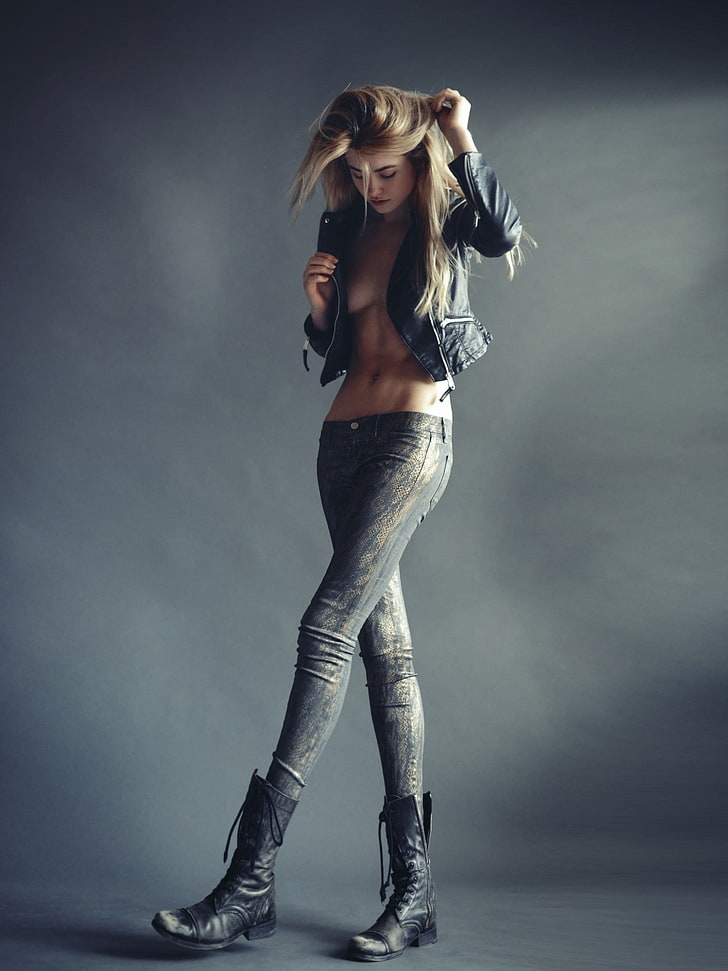black leather jacket, topless, women, blonde, jeans, gray background