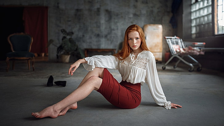 women's white long-sleeved shirt, redhead, hips, legs, skirt