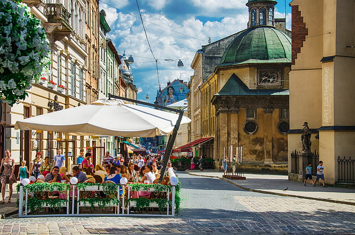 green and brown dome building, ukraine, lviv, street, cafes, people