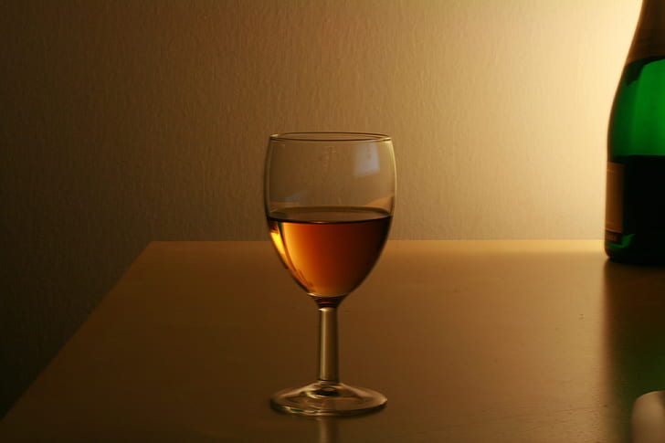 clear wine glass with liquid inside on table, table  wine, wine bottle, HD wallpaper