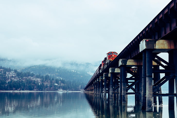 red and black train, bridge, water, trees, mountains, clouds, HD wallpaper