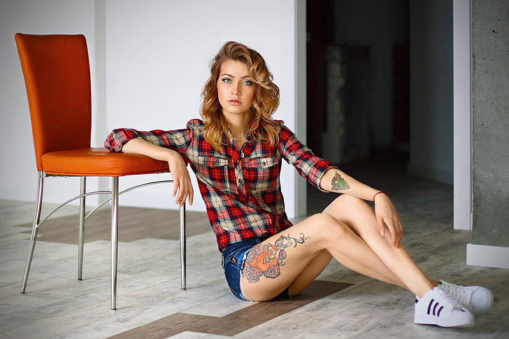 black and red checked sport shirt, women, sitting, tattoo, chair