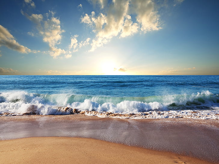 Beach, sand, blue sea, waves, clouds, sun, body of water  under blue cloudy sky