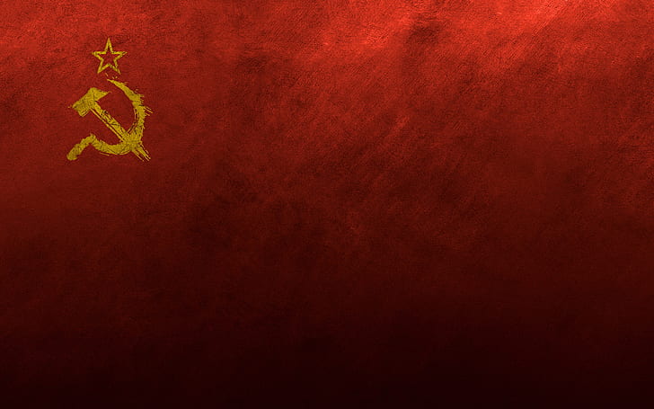 The Color Of Soviet Union Flag On Shirt And Hanging On The Wall With Brick  Pattern Wallpaper. A Plain Red Flag With A Golden Hammer And Sickle And A  Gold-bordered Red Star