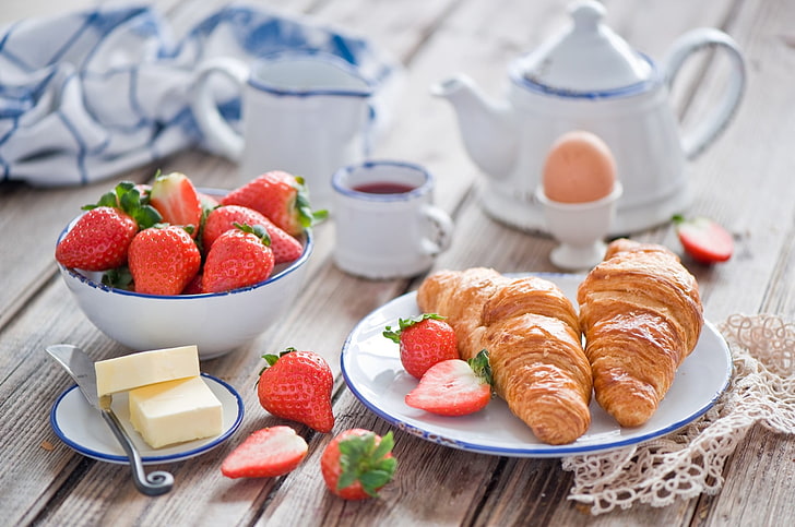 red strawberries, croissants, butter, egg, breakfast, dishes