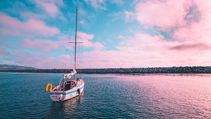 white and blue sailboat, sunset, pink, sea, California, sky, water