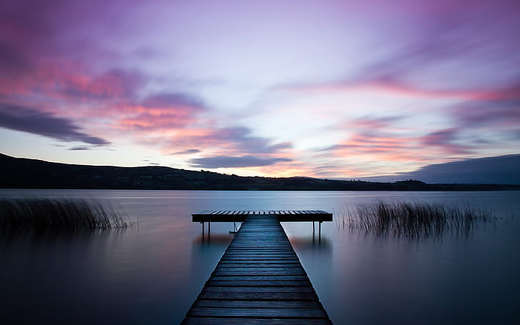 Ireland landscape, river, water surface, wooden bridge, dawn, purple sky, gray lake dock