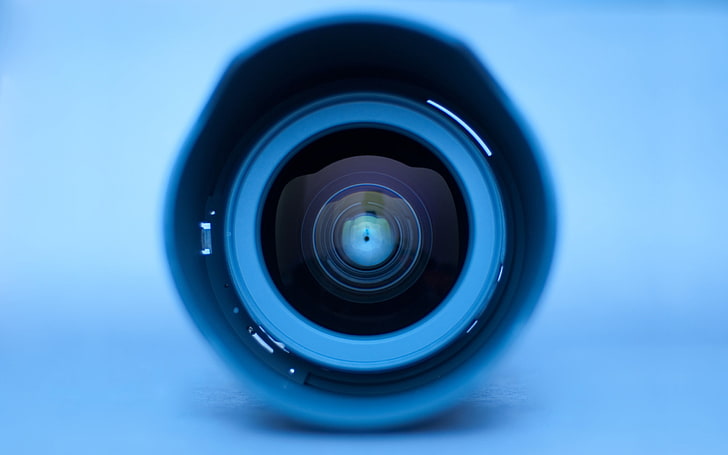 black and blue lens, white and gray camera, eyes, macro, simple background