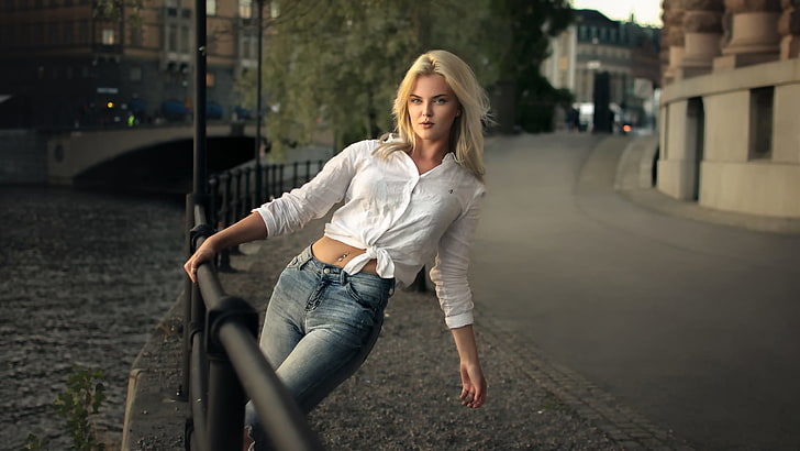 women's white dress shirt and blue denim bottoms, urban, women outdoors