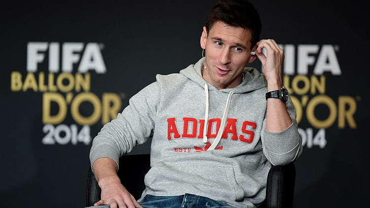 Lionel Messi of Barcelona and Argentina speaks to the media, men's grey and red adidas pullover hoodie
