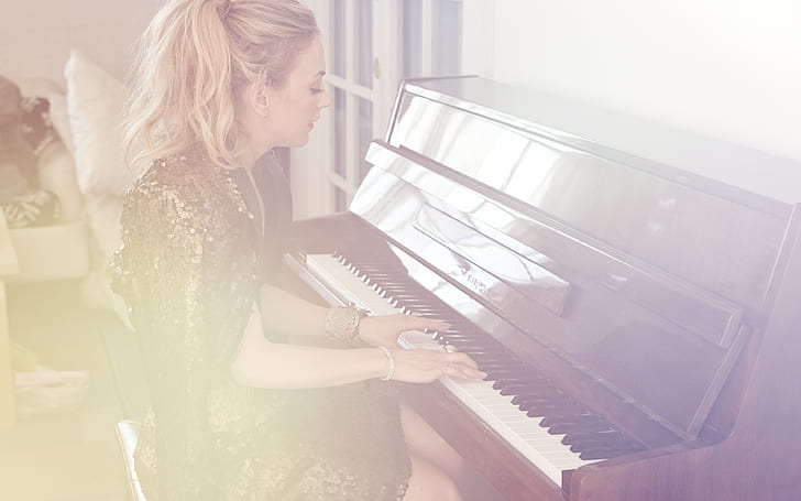 Emily Kinney Playing Piano, brown white and black upright keyboard