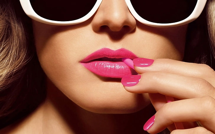 woman wearing white-framed sunglasses, pink, painted nails, pink lipstick