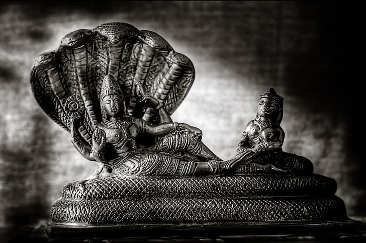 Lord Vishnu Yoga Nidra, person sitting on snake figurine, God