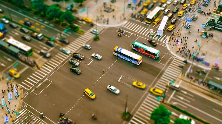aerial shot of cars on road, street, traffic, tilt shift, city