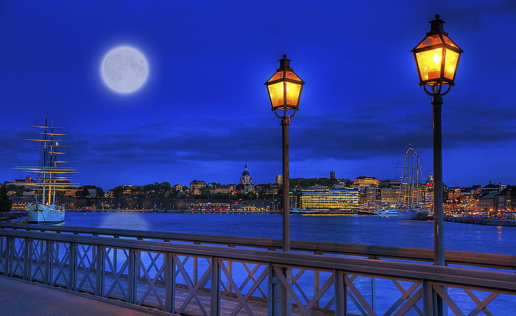 two black steel post lamps in gray bridge, stockholm, stockholm