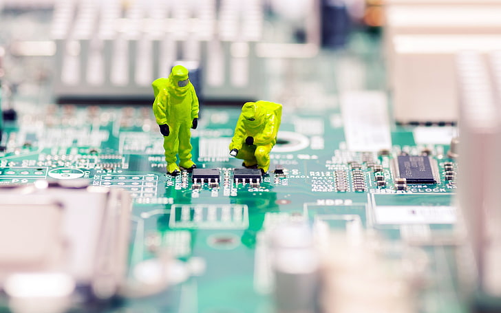 green IC board, shallow focus photography of green circuit board