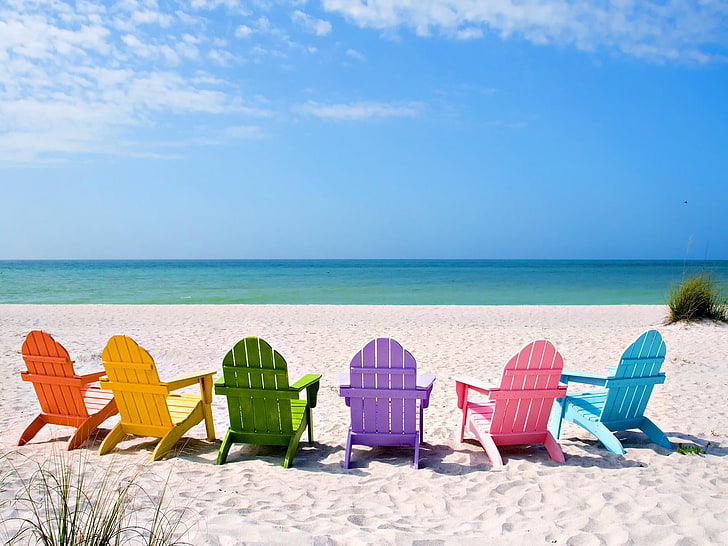 Delightful Benches At The Beach, six assorted-color Adirondack chairs