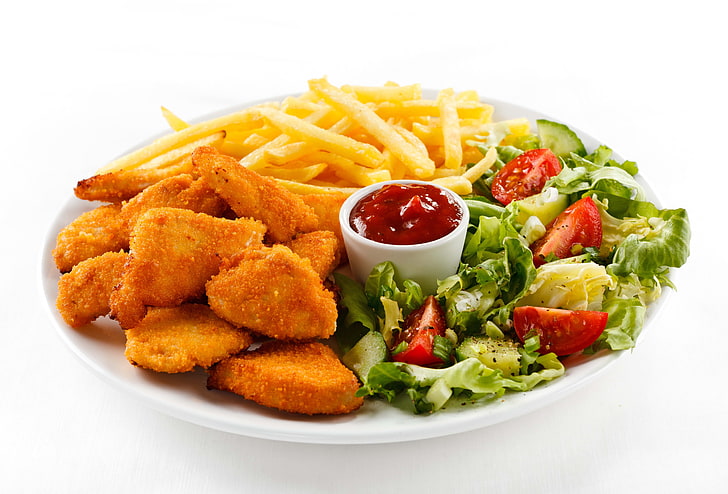 nuggets, fries, and vegetable salad, plate, lettuce, ketchup