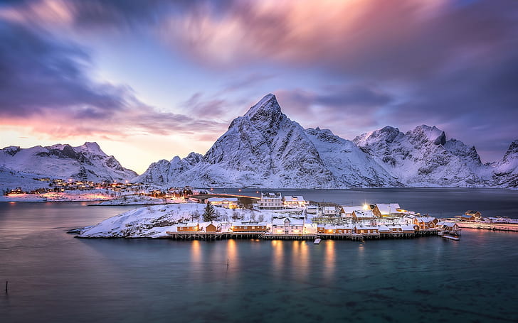 Norway, Lofoten archipelago, village, island, fjord, mountains, snow, dusk, lights