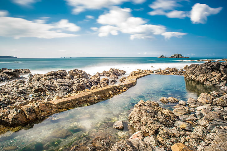 rock seaside with clear ocean wave under cloudy sky at day time, united kingdom, united kingdom