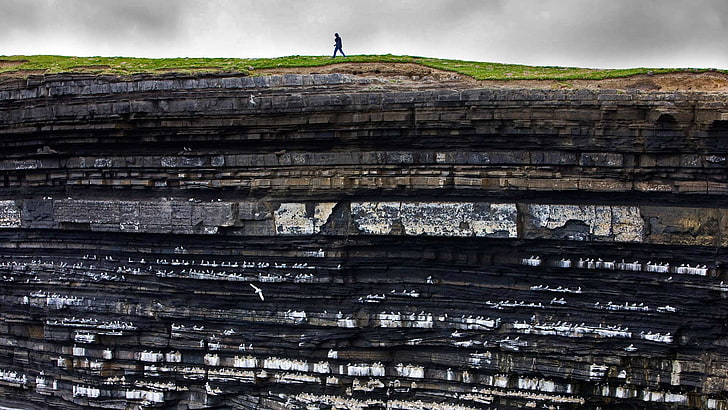 person standing on cliff photo, Ireland, nature, people, walking
