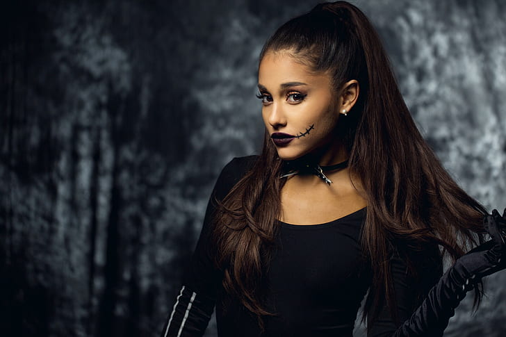 Ariana Grande is unrecognizable as she shows off her natural curls