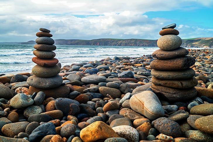 low angle photography of two piles of stones near seashore during daytime, HD wallpaper